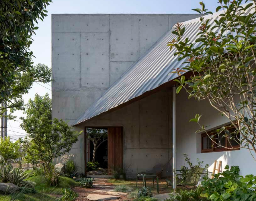 Архитектура Пересекающаяся геометрия дома и кафе GEHL architects во Вьетнаме